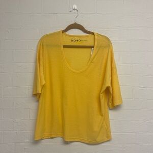 NWT T-shirt. UO KO+O yellow oversized boxy tee. Great Layering tee!